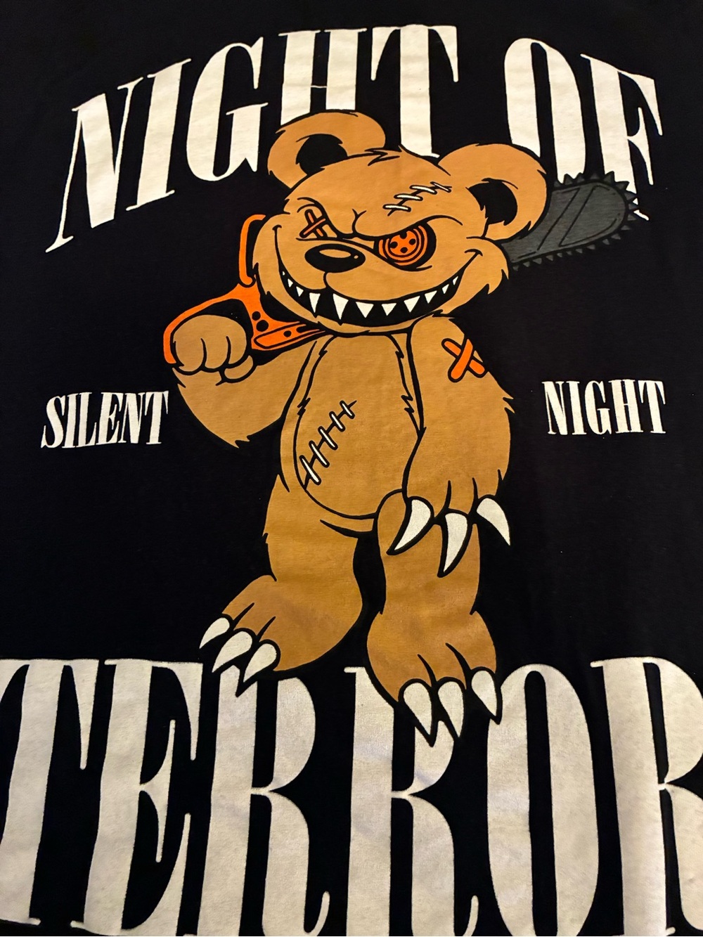 Pre-owned Eighty Eight Black Tee with Orange Bear White Text carrying chainsaw